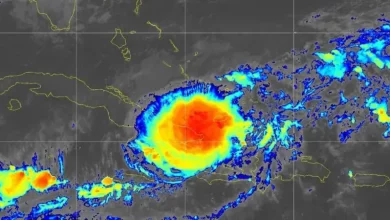 Foto de Oscar se reduce a tormenta tropical pero su lento avance por Cuba es potencialmente mortal